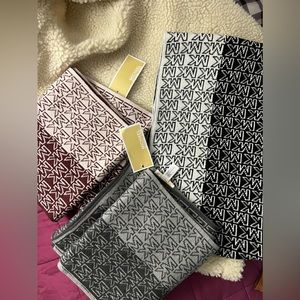 Michael Kors scarf. Three colors:Maroon/pink, black/white,light and dark gray.
